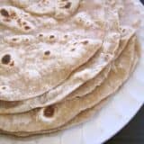 Homemade tortillas on a plate.