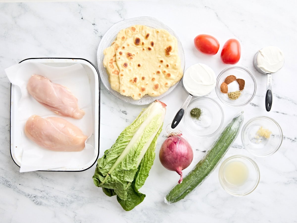 The ingredients to make a chicken shawarma wrap.