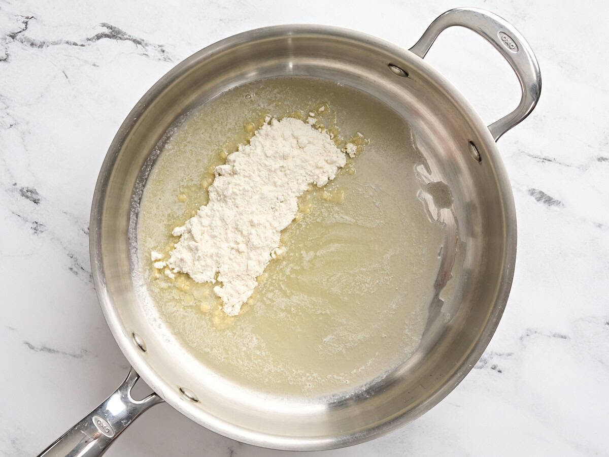 Butter and flour in a skillet to make a roux.