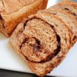 Chocolate cinnamon bread displayed on a serving plate.