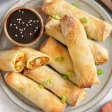 Overhead view of homemade vegetable egg rolls on a plate.