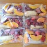 Smoothie packets displayed on a kitchen counter.