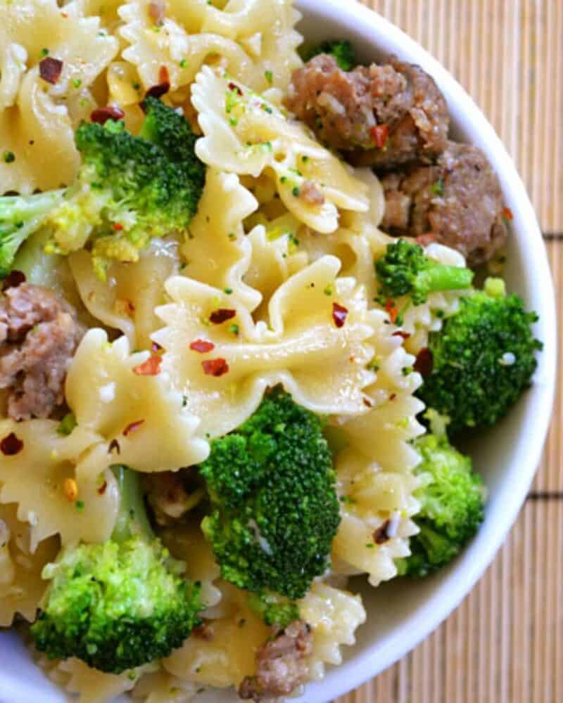 Bowl of sausage and broccoli pasta.