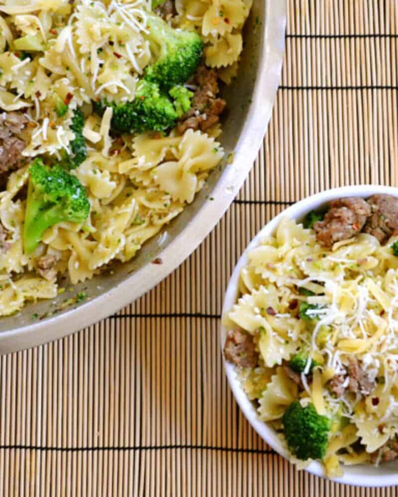 Bowls of sausage broccoli pasta.