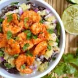 Chili lime shrimp served in a bowl with rice.