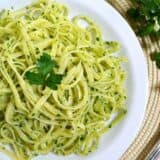 Close-up of parsley pesto in a plate.