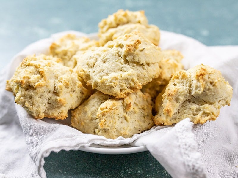 Rosemary Pepper Drop Biscuits are an easy to make side for soups and stews. No kneading or cutting biscuits, just mix, drop, and bake! Budgetbytes.com A basket full of freshly baked Rosemary Pepper Drop Biscuits