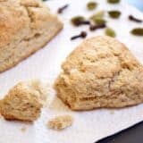 Crumbled chai scones with spices on a plate.