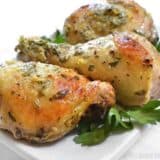 A trio of Greek marinated chicken served on a platter.