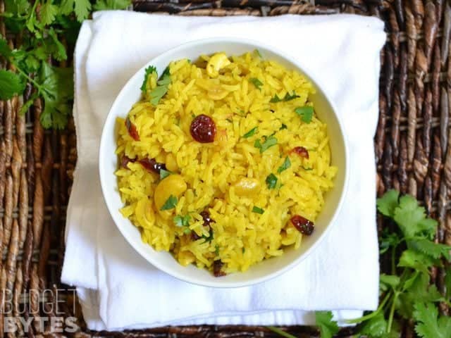 Top view of a bowl of Cashew Rice Pilaf on a white napkin