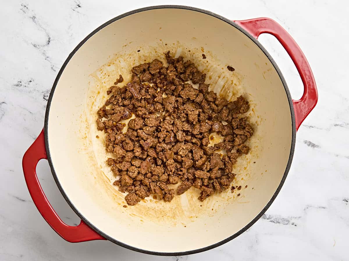 Mexican chorizo cooking in a large pot.
