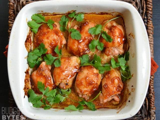 Top view of finished Honey Sriracha Chicken Thighs in baking pan