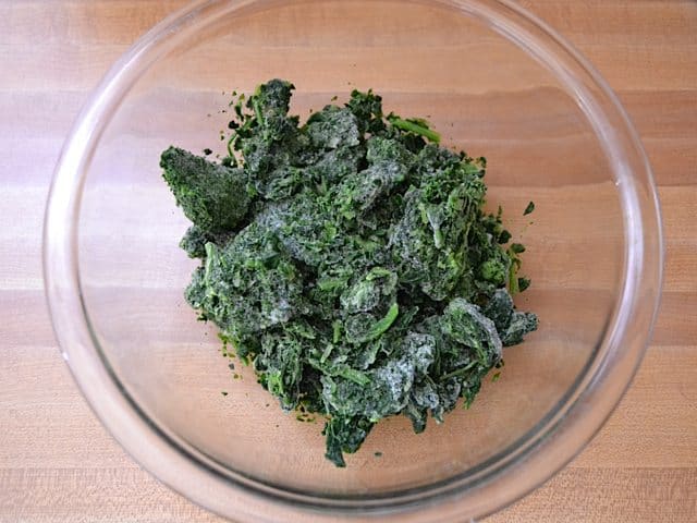 Frozen Spinach in mixing bowl