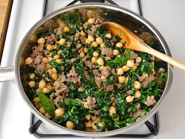 Chickpeas added to skillet