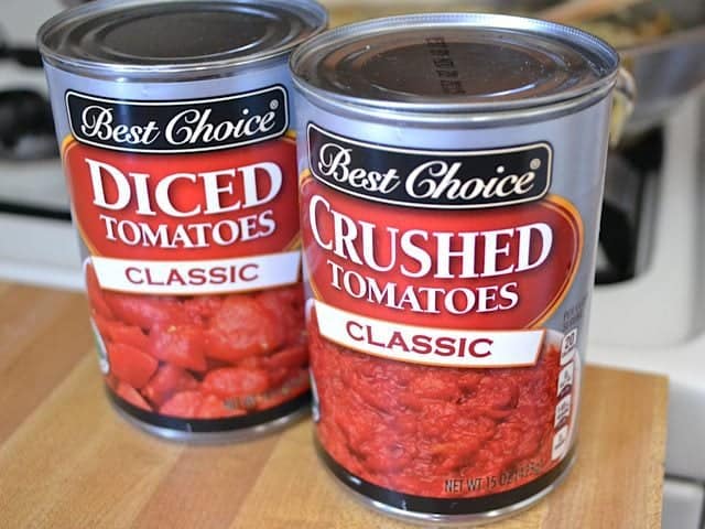 One can of diced tomatoes and one can of crushed tomatoes