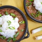 A close-up of veggie red beans and rice in a bowl.