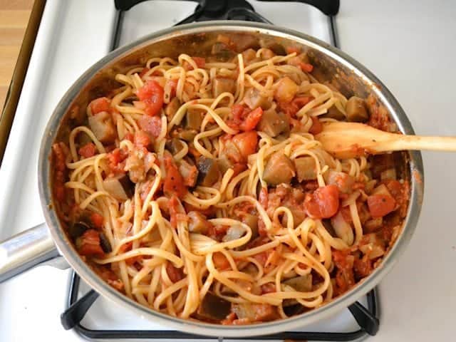 Cooked pasta added to skillet with sauce mixture