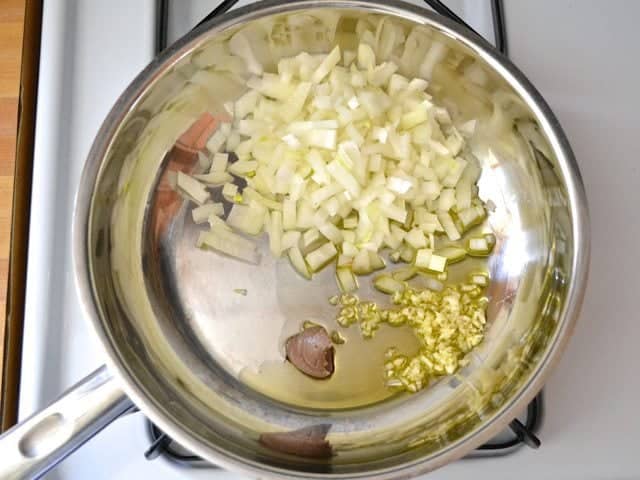 Onion, Garlic, Anchovy paste, cooking in skillet