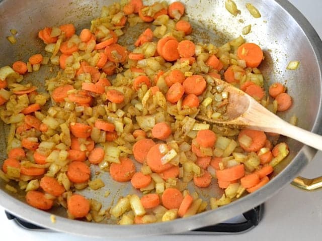 Onions and Carrots added to skillet