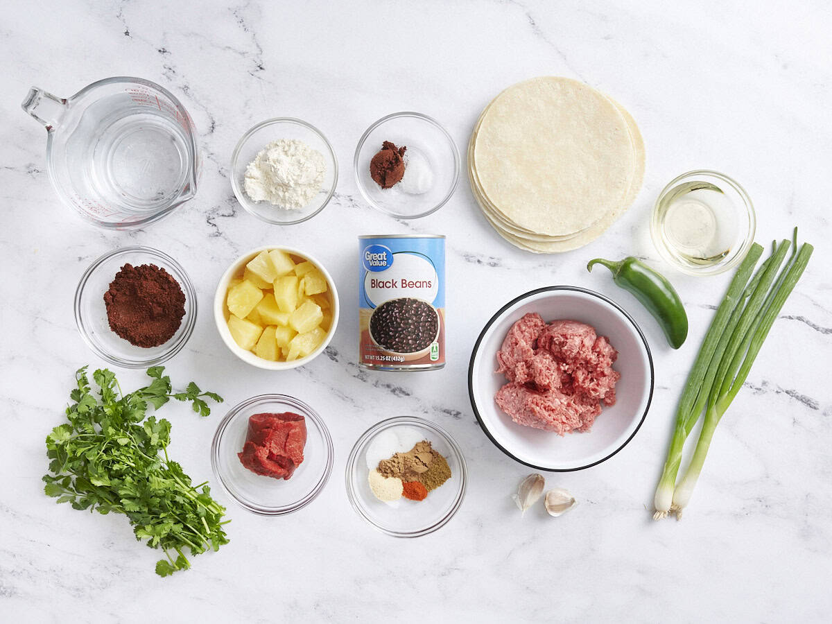 The ingredients to make beef enchiladas.