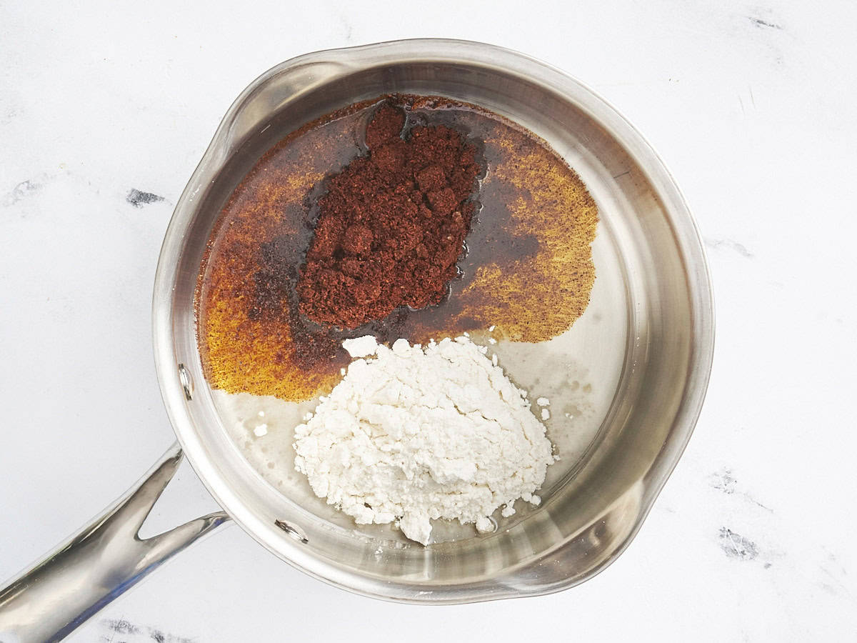 Chili powder and flour in a skillet.