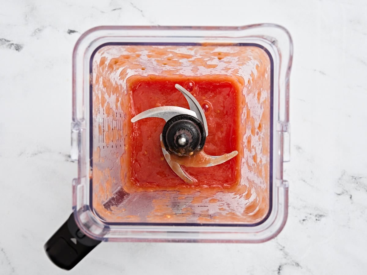 Blended canned tomatoes in a blender.