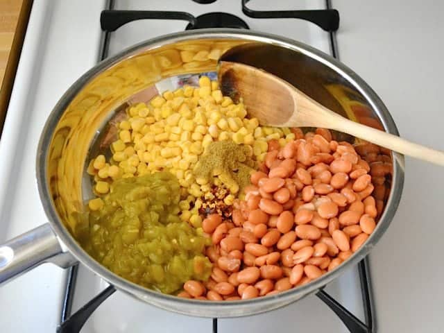 Green Chiles, Corn, Beans and Spices added to skillet