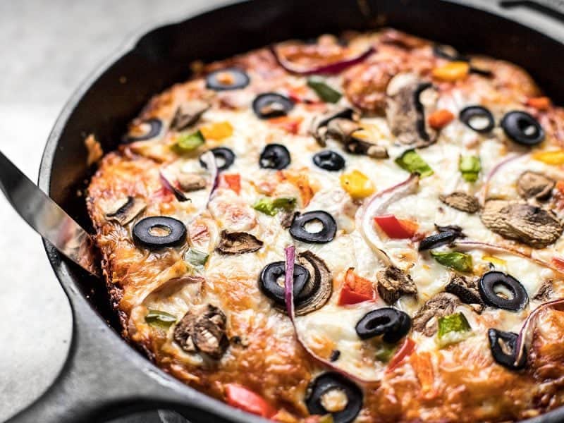 Close up of baked pizza in skillet