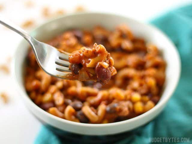 This super hearty One Pot Chili Pasta is bursting with southwest chili flavor, protein, and fiber. It's a meal in a bowl that the whole family will love. Budgetbytes.com A forkful of One Pot Chili Pasta
