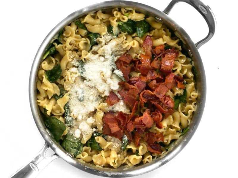 Bacon and parmesan cheese added to skillet with the rest of the ingredients
