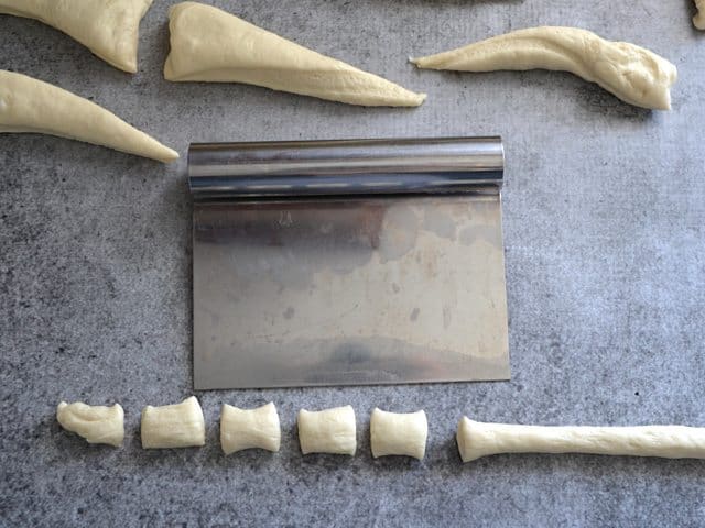 One wedge taken and rolled into a rope shape and then cut into small bits