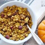 A bowl of pumpkin granola with nuts and seeds.