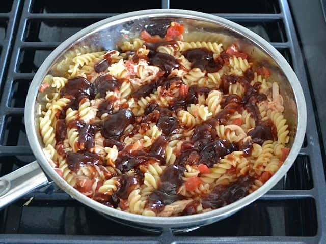 BBQ Sauce poured on top of cooked skillet