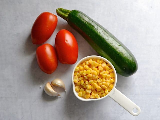 Zucchini, corn, garlic and tomatoes