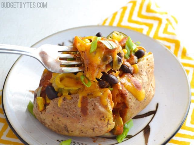 Forkful of nacho tater being scooped out