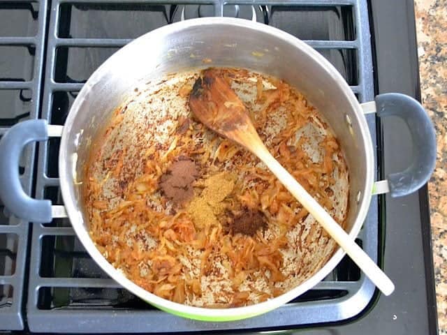 Spices added tot pot with onions
