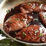 Finished Blackberry Sage Pork Chops in the skillet