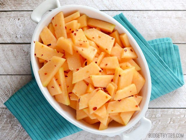 Top view of a. dish o.f Chili Lime Cantaloupe sitting on a green napkin