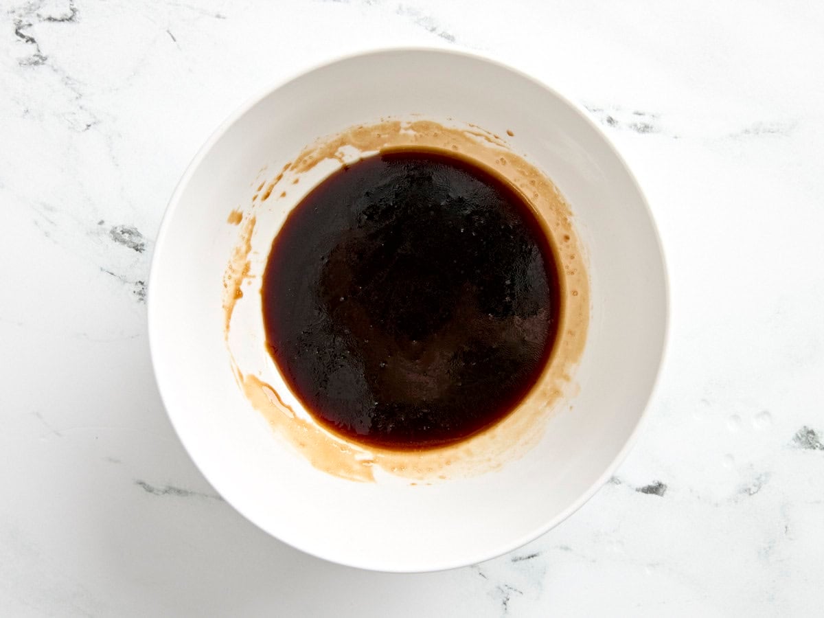 The sauce for garlic noodles in a mixing bowl.