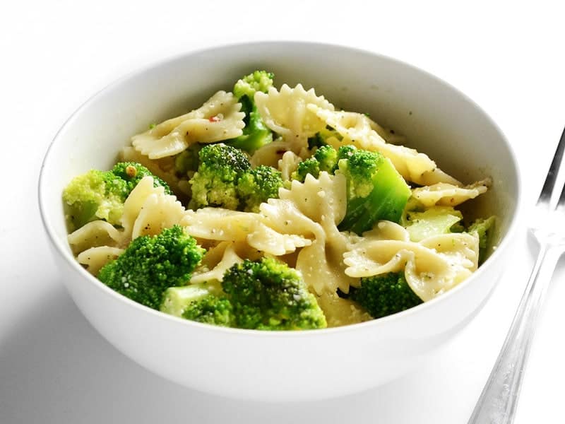 This insanely simple dinner "cheat" is ready in minutes and will keep you full for hours. Bowties and Broccoli is my go-to lazy weeknight dinner. Budetbytes.com Side view of a bowl full of bowties and broccoli
