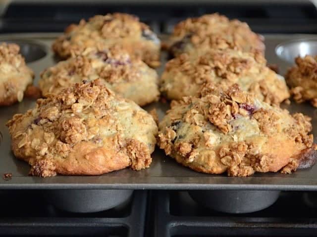 Baked muffins viewed from the side in the muffin tin
