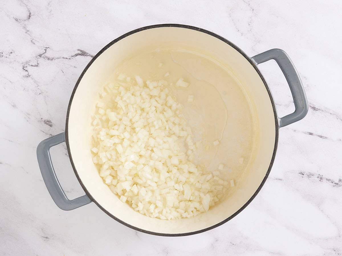 Diced onion in a pot with oil.