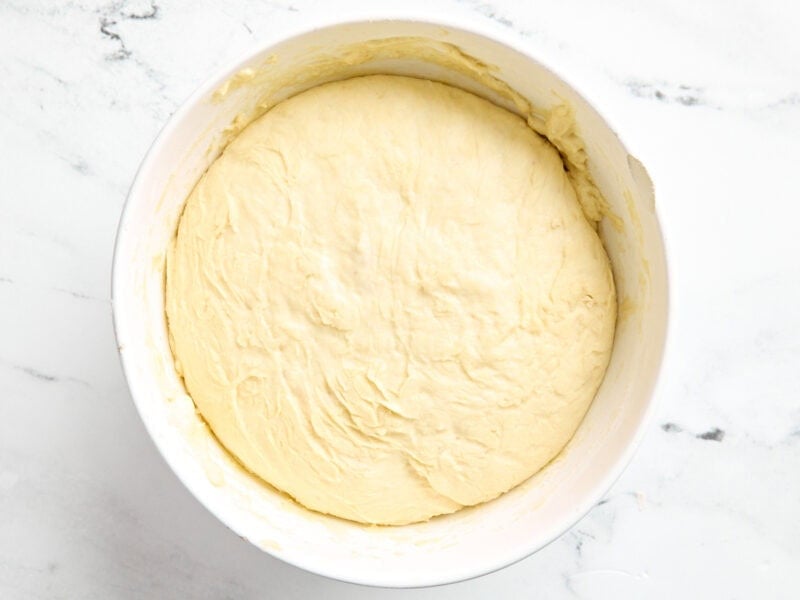 A bowl of risen dough.