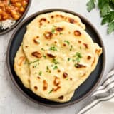 homemade naan from overhead on a plate