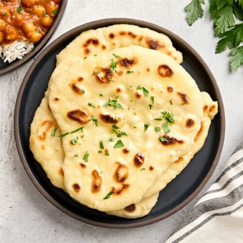 homemade naan from overhead on a plate