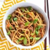 Stir-fry beef noodles served in a bowl.
