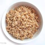 Overhead view of a bowl full of plain cooked farro
