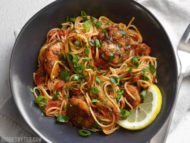 This quick and easy 30 minute Blackened Shrimp Pasta with homemade blackening seasoning boasts huge flavor without a lot of work. Budgetbytes.com Blackened Shrimp Pasta in a bowl seen from above