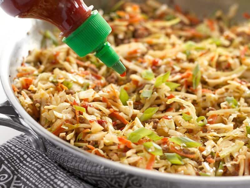 Garnish with Sriracha and Sesame Seeds