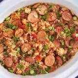 Jambalaya in a white crockpot.